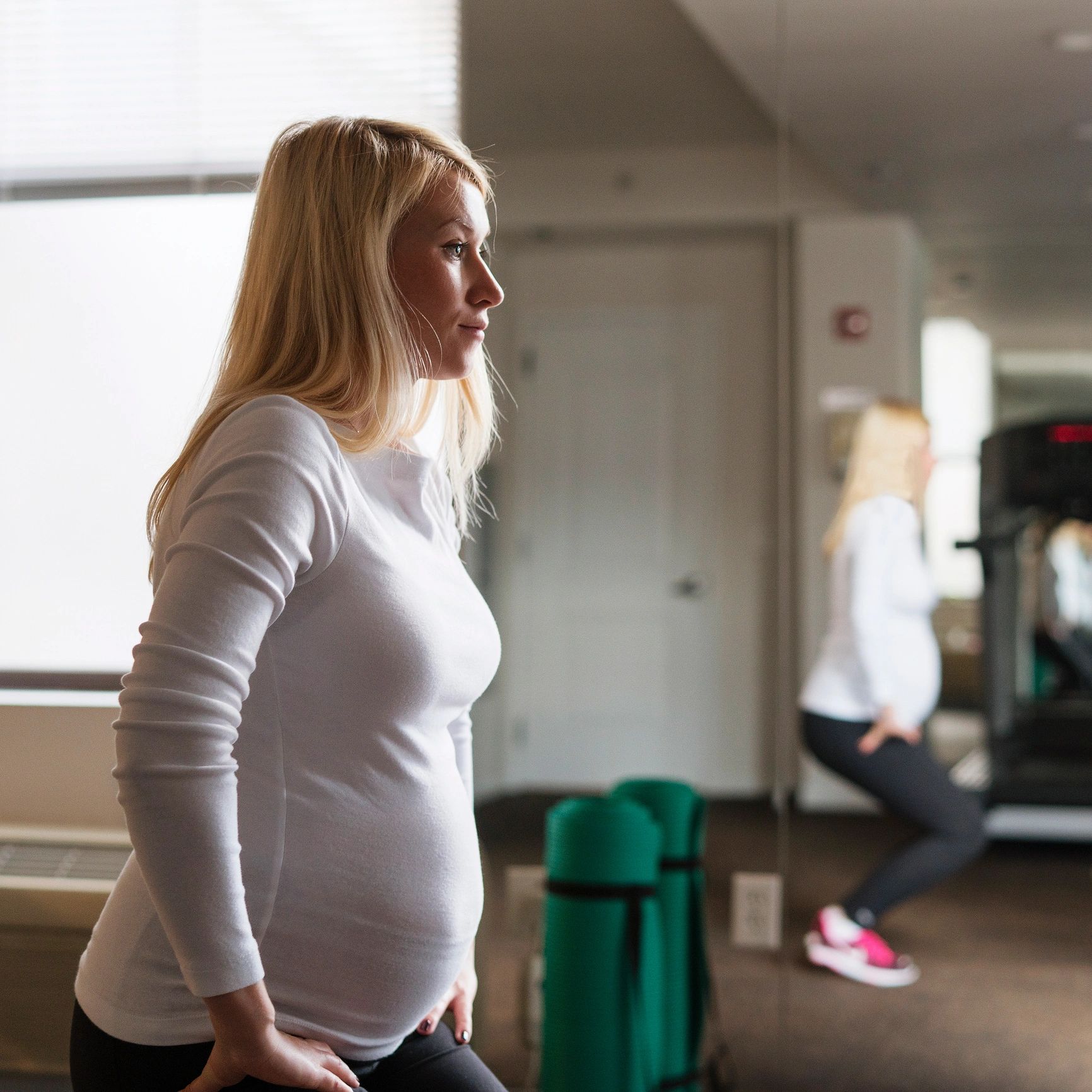 Woman doing a bridge exercise with a stability ball